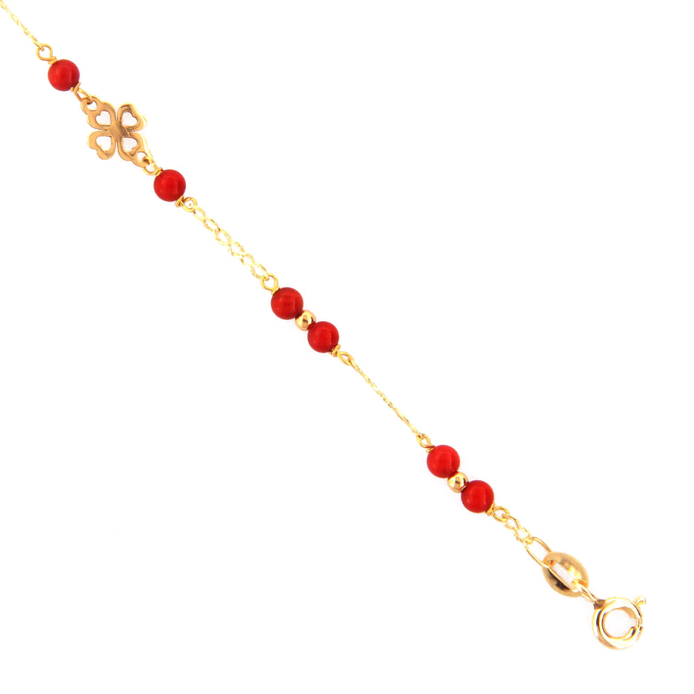 Bracciale Battesimo Bambina in Oro Giallo e Corallo con Quadrifoglio