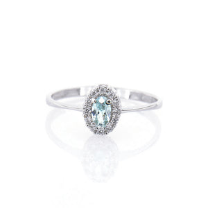 Anello Donna Rosetta in Oro Bianco con Topazio Azzurro e Zirconi