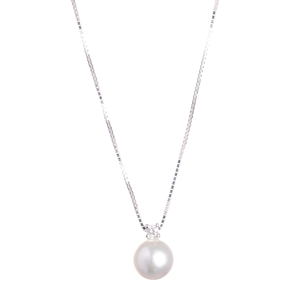 Collana in oro bianco 18k a fiore con diamanti e smeraldi | GV Collana in oro bianco 18k a fiore con diamanti e smeraldi | GV